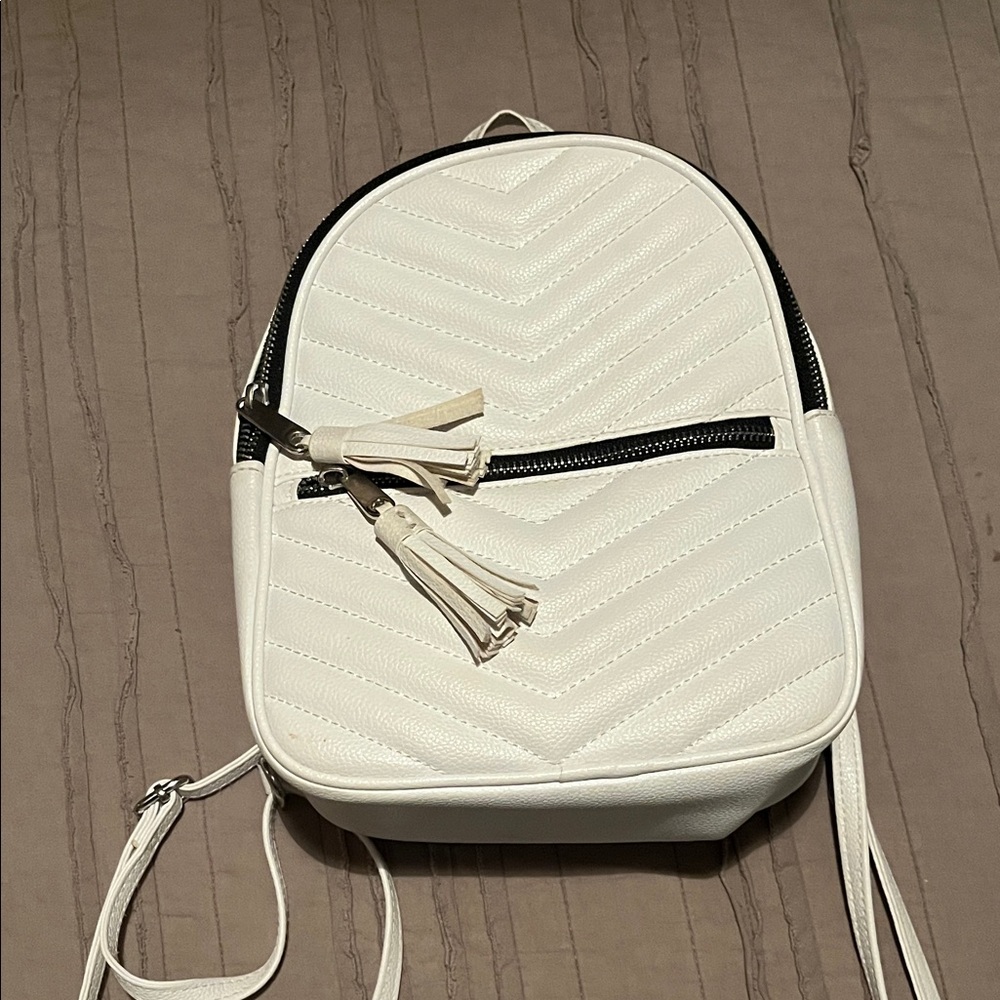 Claire's White Quilted Mini Backpack with Tassel Zipper